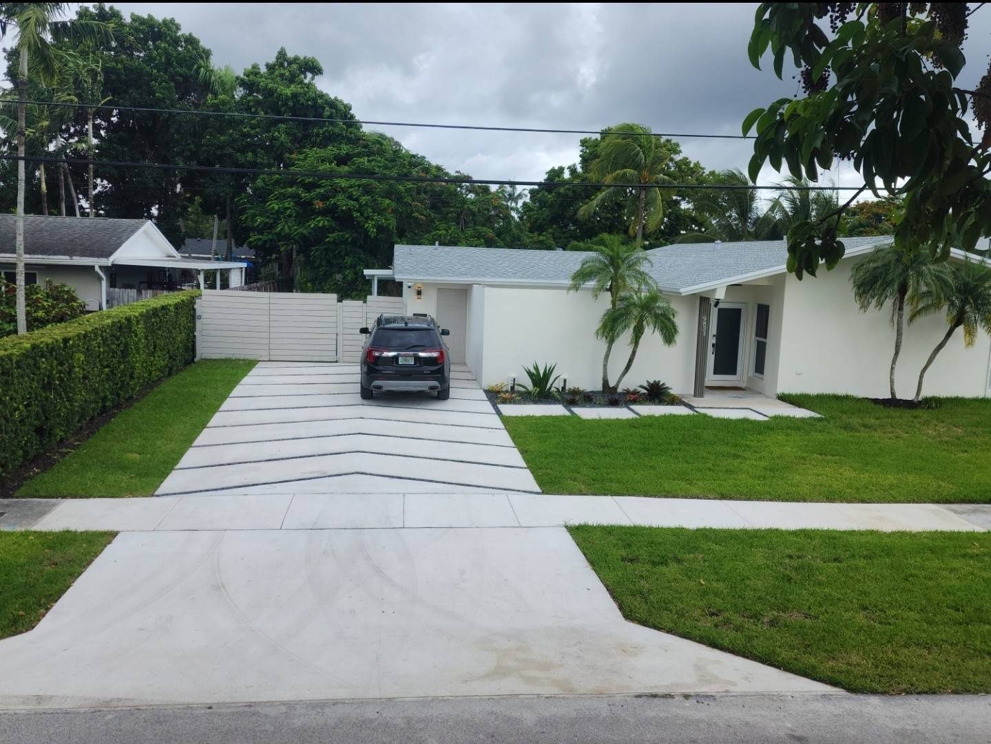 Finished driveway with lawn strips