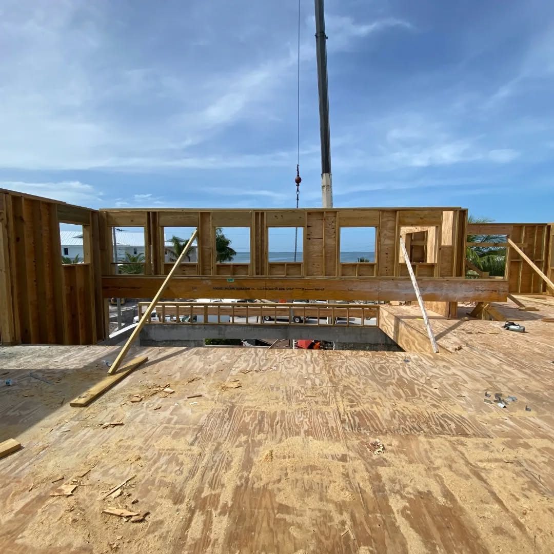 Second-floor wall framing, set by crane